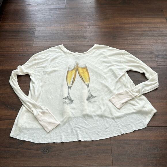 WildFox Pee Loved Long Sleeve Oversized Top with Champagne glasses graphic. - Picture 1 of 6